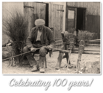 Man making brooms